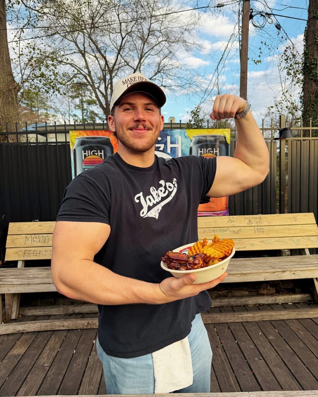 Bouncers doing more than checking ID's by serving Wings and Fries at Jake's bar in Five Points Columbia South Carolina
